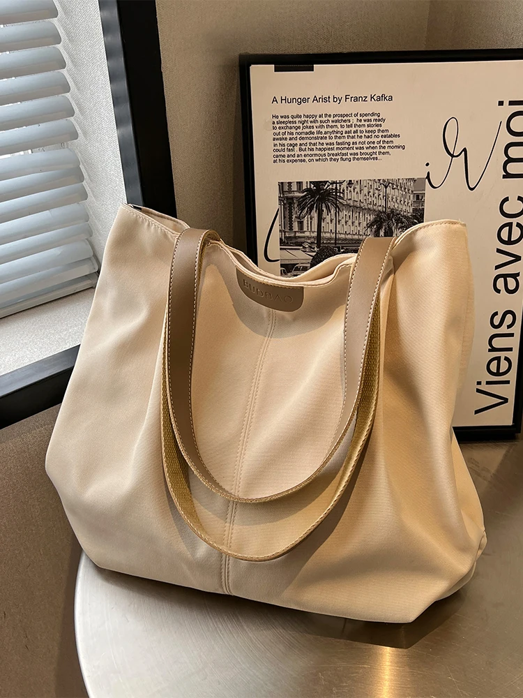 

Casual Canvas Tote Bag Women's Large Capacity Shoulder Bag for Commuting And Shopping Simple Style Double Root Shoulder Strap