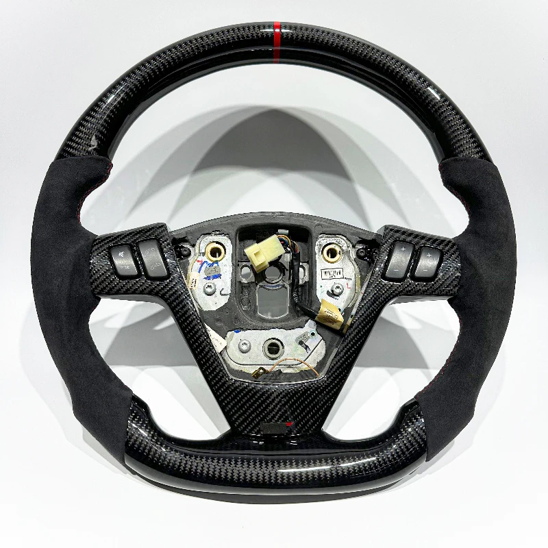 

Руль из черного карбона для Cadillac CTS, CTS-V, CTS, ATS, XTS, CT4, CT5, XT4, XT5, XT6 – прямые продажи с завода