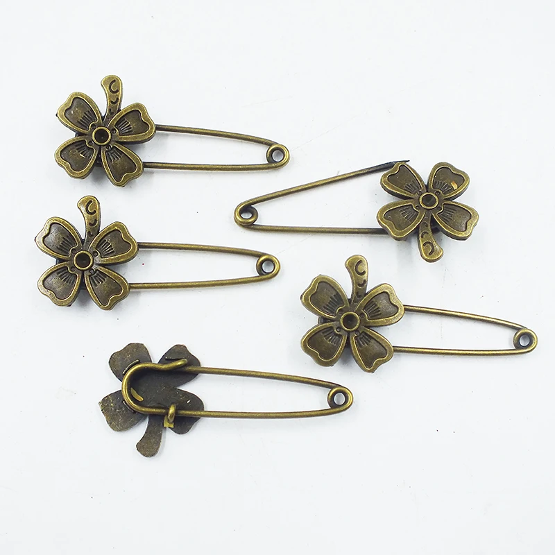 

Best selling!!! Beautiful flower shape bronze safety pins 100pcs for sale