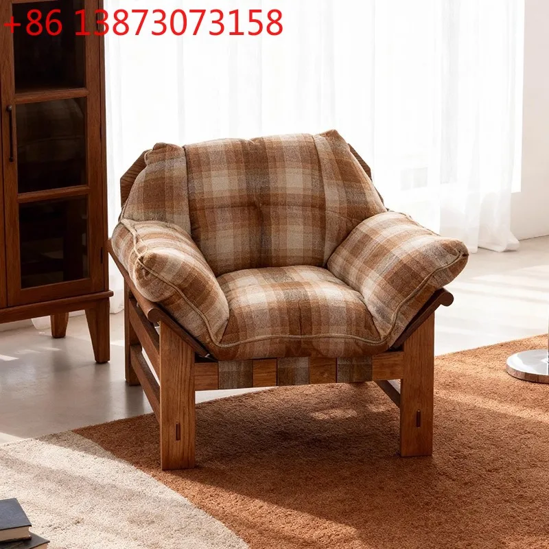 

Nordic-style wooden single sofa chair light luxury villa living room balcony can be used in the rest and reception area of the s
