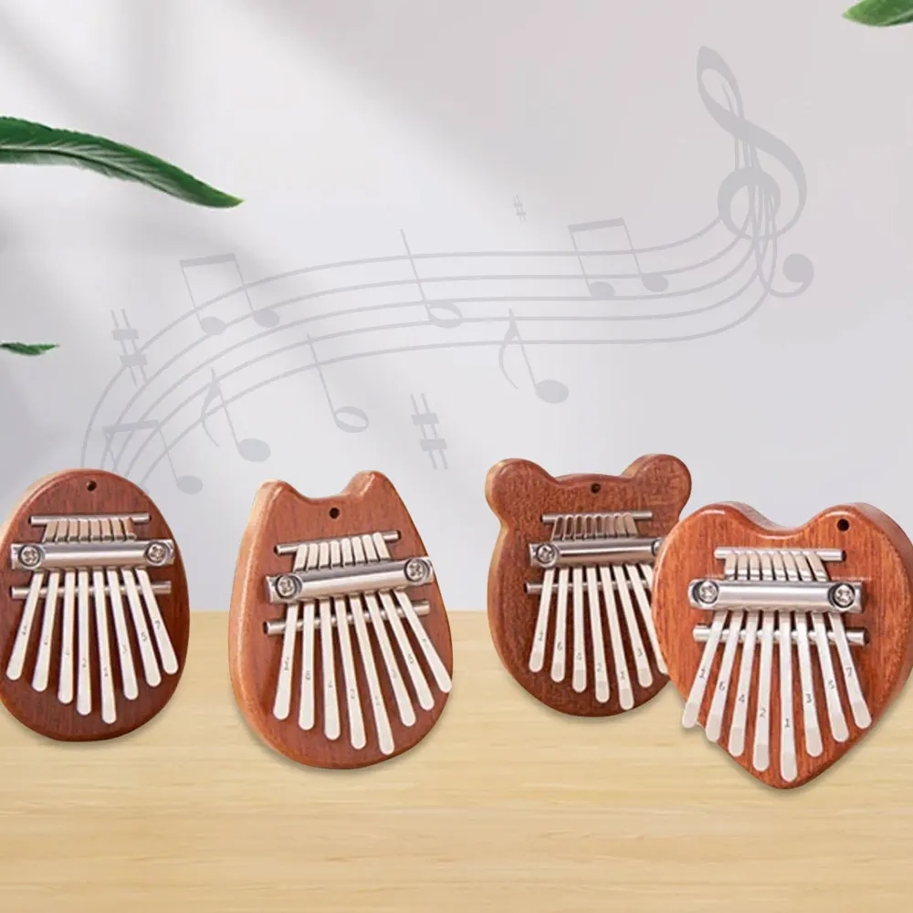 Mini Piano de pulgar Kalimba de 8 teclas, regalos para principiantes, amantes de la música, jugadores, lindo instrumento colgante, llavero, accesorios