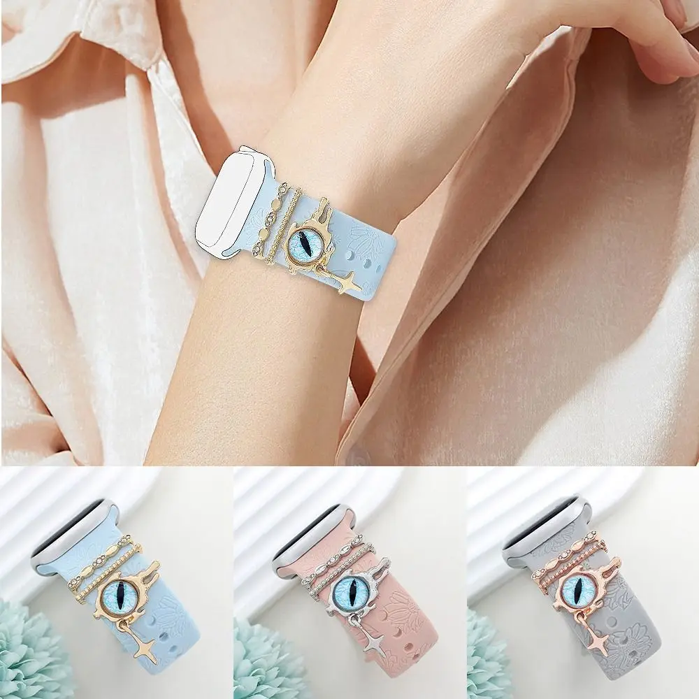 สายรัดโลหะตกแต่งแหวนเครื่องประดับเพชรสร้อยข้อมือตกแต่งตาสีฟ้า Charms เครื่องประดับสําหรับ Apple Watch Band