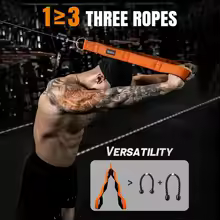 Athlete using tricep strap on cable machine