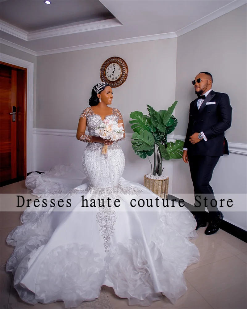 

Arabic Aso Ebi Plus Size Shinny Crystals Beads Mermaid Wedding Dress 2025 Long Sleeves Cascading Ruffles Bridal Gowns Customized