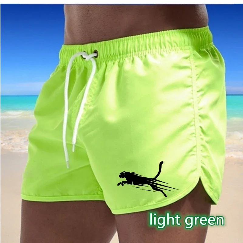 New men's shorts plus size Three minutes of pants summer beach surfing shorts breathable casual running training sports shorts