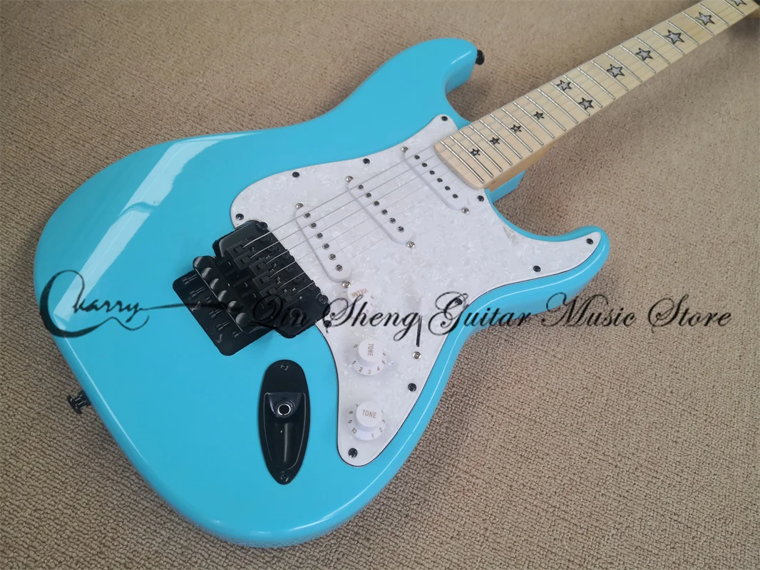 6-string electric guitar, stra sky blue guitar, tremolo bridge, black buttons, star inlay