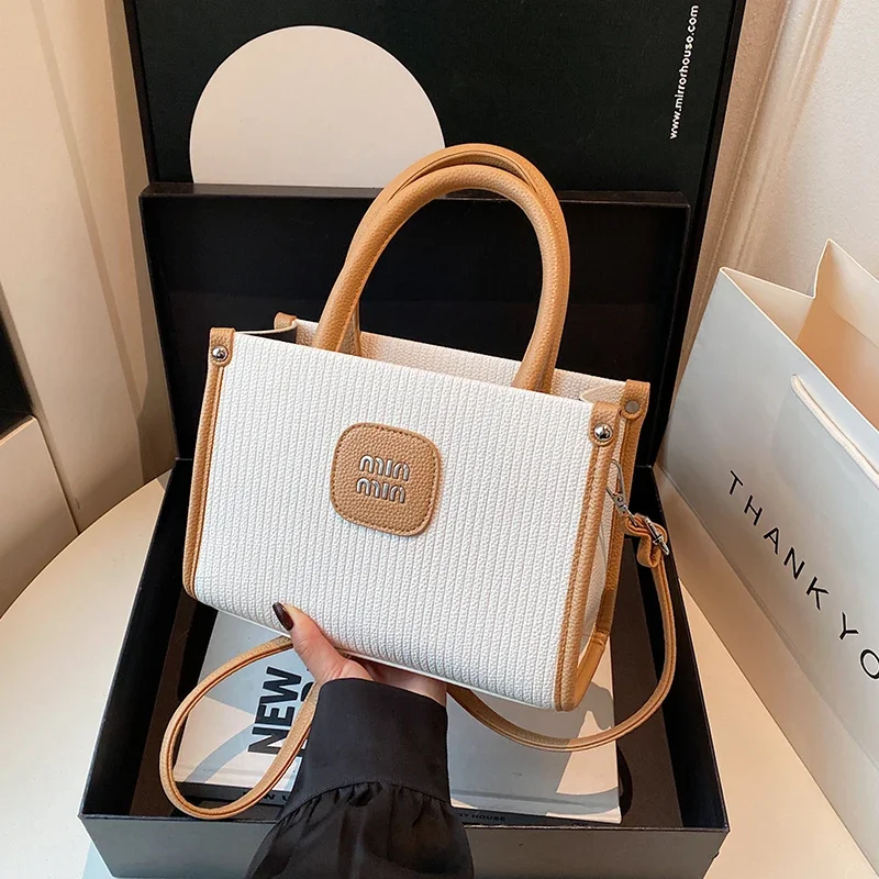 

Роскошная модная простая большая сумка для женщин для офисного использования, элегантная кожаная большая вместимость, винтажный однотонный дизайн