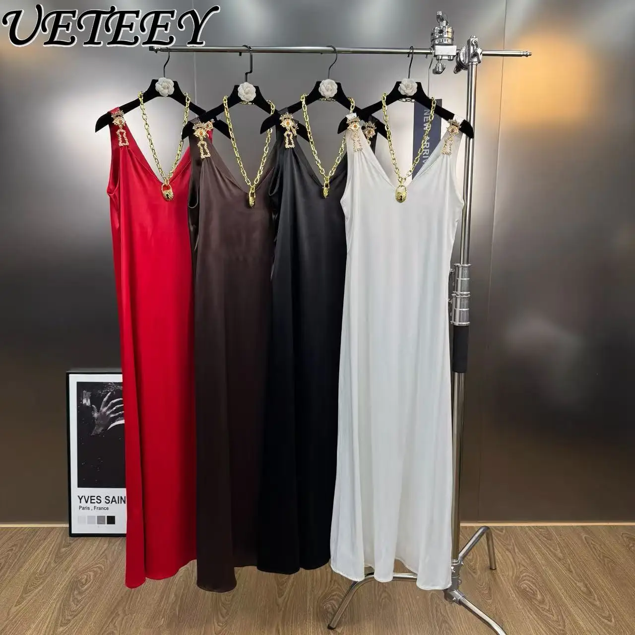 Primavera novedad de verano estilo Retro francés hebilla de Metal decorado Color sólido vestido largo con cuello en V profundo sin mangas vestidos sin mangas de moda