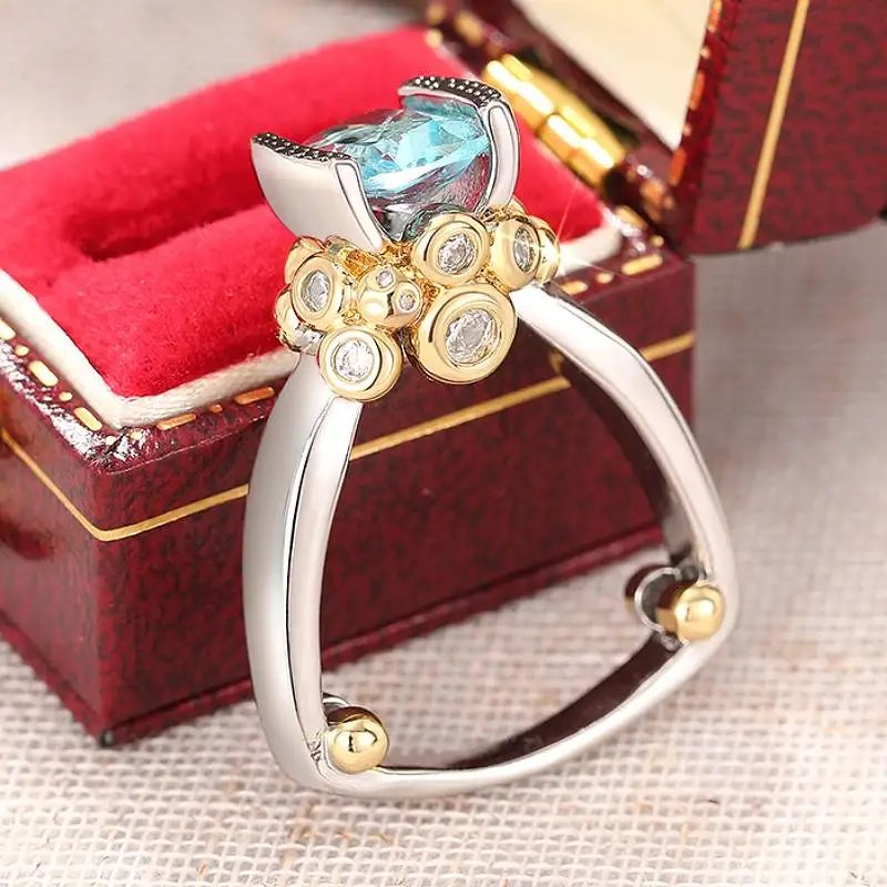 Huitan Vielseitiger zweifarbiger Damenring für Party, Mode, mit brillantblauem CZ-Stein, Hochzeitsaccessoires für Damen, zurückhaltender, schicker Schmuck