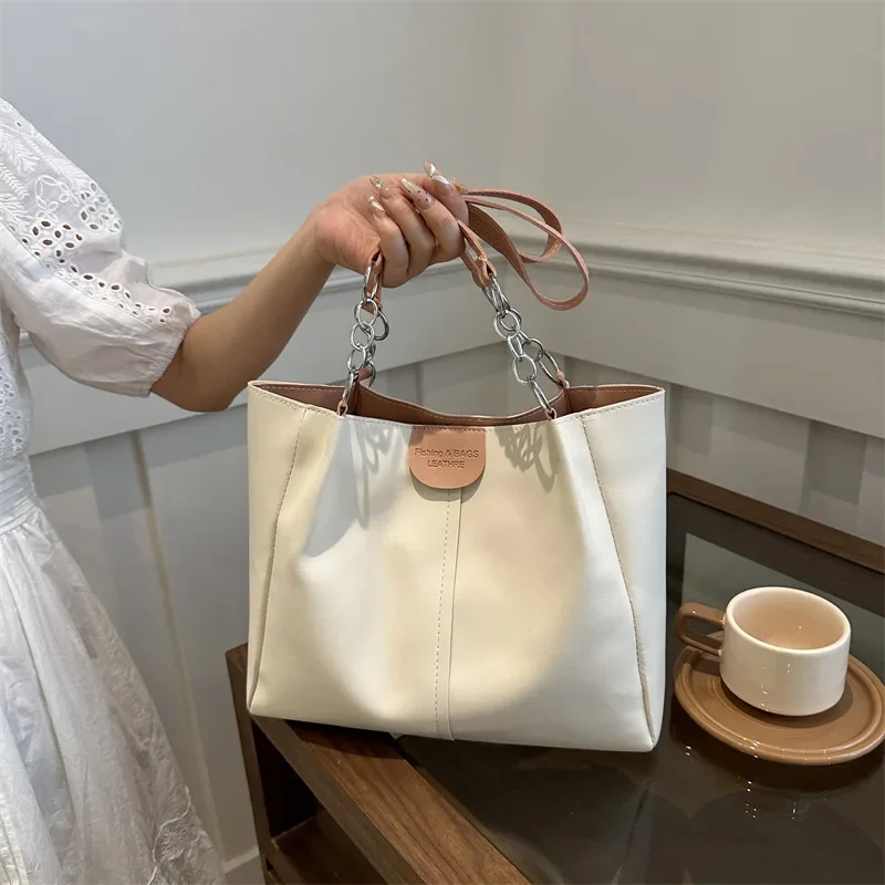 

2024 Hot Seller Autumn Winter New Fashion High-grade Sense Large Capacity Bag Female Commuter Color Bump Shoulder Bag Tote Bag