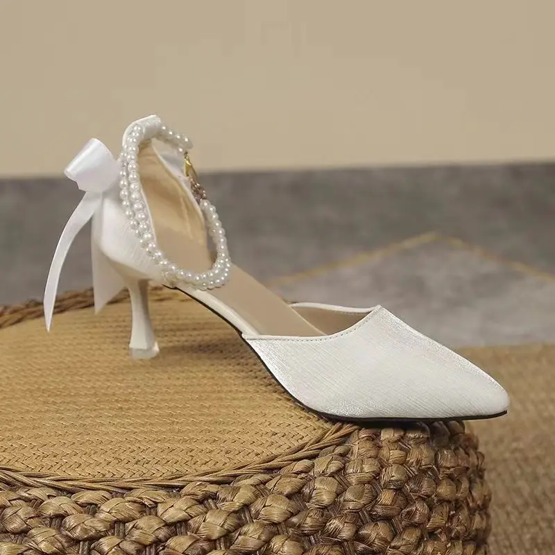 Damenmode einz eilige High Heels Herbst neue spitze flache Mund dünn mit Schmetterling Knoten Kopf hohle Einzels chuhe