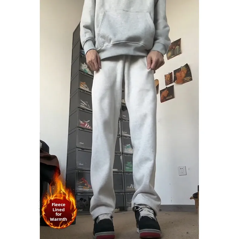 Pantalones de hombre con forro polar, de pierna ancha, corte recto, cintura baja, deportivos, para otoño e invierno, de tela gruesa y caída elegante, de marca de moda.