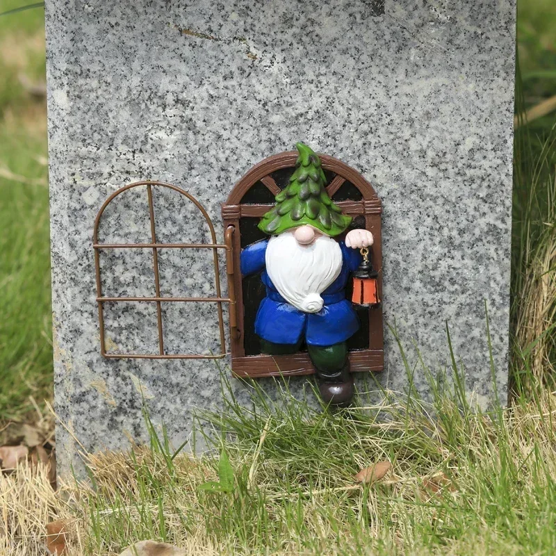 

A White-bearded Dwarf Lantern Hangs From A Resin Pendant Outside A Window For Halloween Decorations