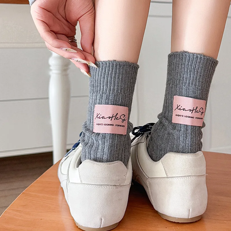 2025 Autumn and Winter Women's Socks Korean Solid Color Black White Gray Long Socks Cloth Label Knitted Cotton Medium Tube Socks
