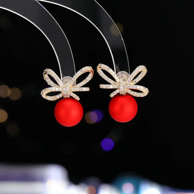 أقراط على شكل فيونكة للأذن لموسم الخريف والشتاء، إكسسوار أذن فريد وراقي أحمر وأكثر احتفالية وأنيقة للنساء جديد 2025