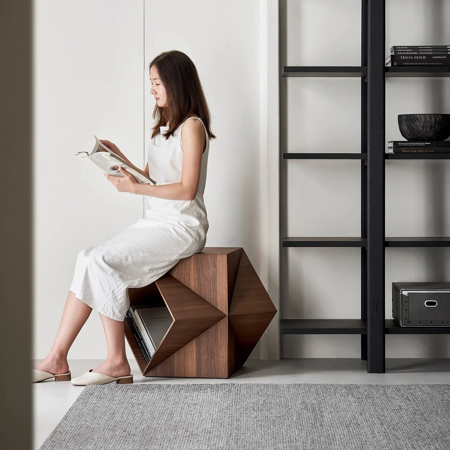 A few polyhedral corners on the side of the sofa, a mobile coffee table