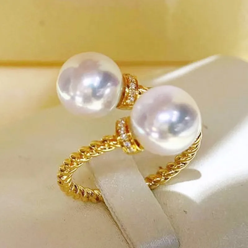 Huitan doppelt simulierte Perlen öffnung verstellbarer Fingerring für Frauen Gold Farbe Twist Band Temperament eleganter weiblicher Schmuck