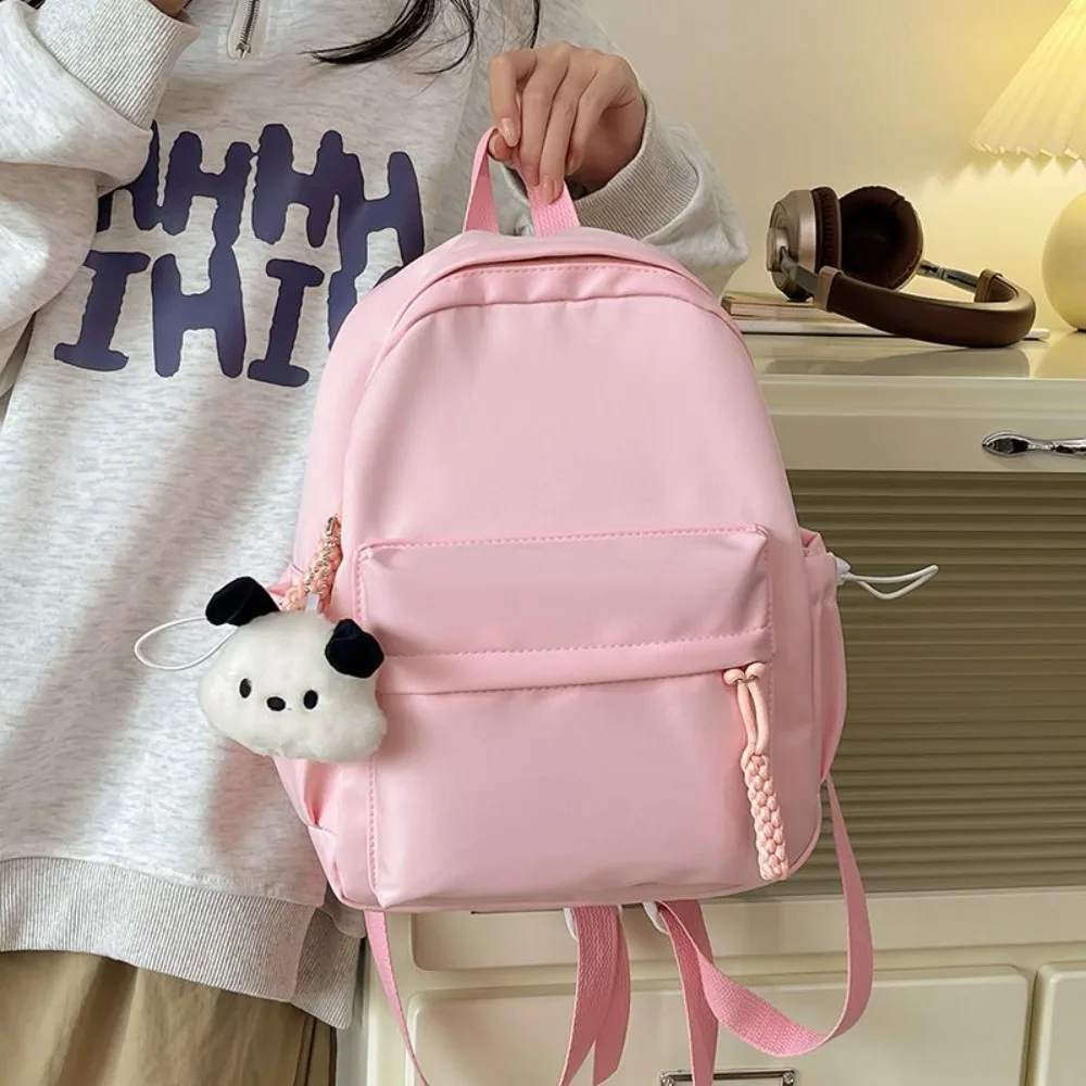 mochila-escolar-de-nylon-respiravel-2026-nova-simples-versatil-leve-estilo-campus-cor-solida-para-estudantes