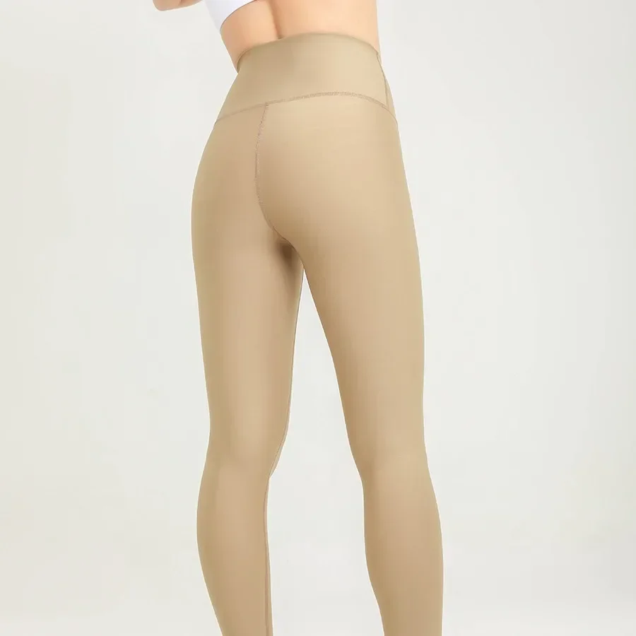 Nuovi pantaloni da Yoga da donna in pelle di squalo per la cura della pelle perla nuda a vita alta pesca Hip Lifting pantaloni sportivi da Yoga