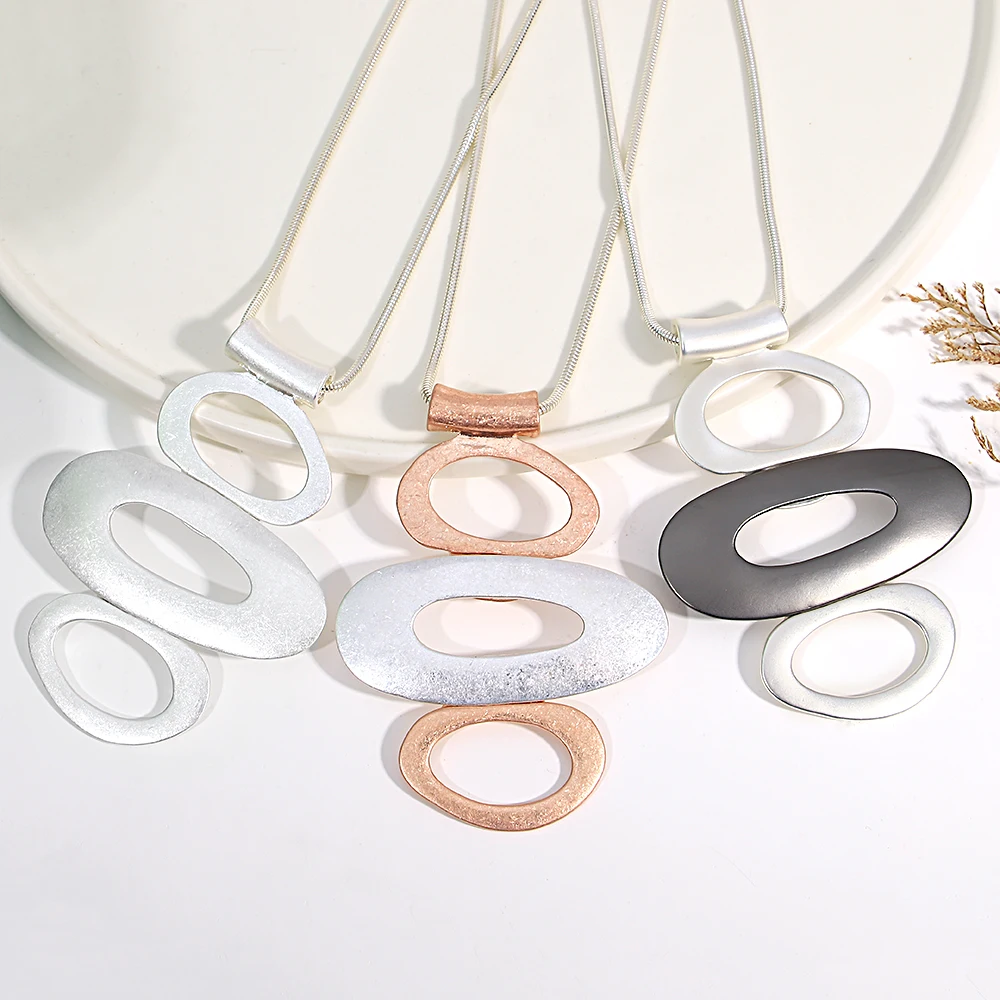 

Amorcome Classic Long Hollow Elliptical Pendant Necklace for Women Smooth Snake Bone Chain Metal Tube Necklace Neck Jewelry Gift