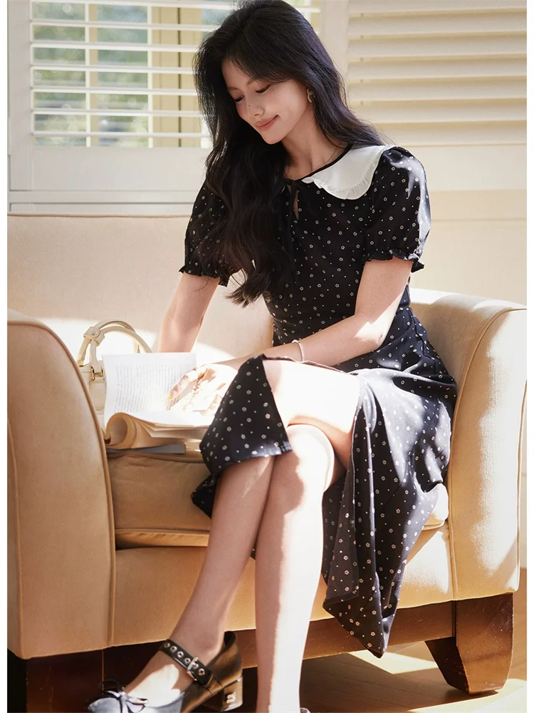 2025 novedad de verano estilo francés de gama alta de manga corta vestido con cuello de muñeca diseño suave único negro dulce vestido de vacaciones bata femenina