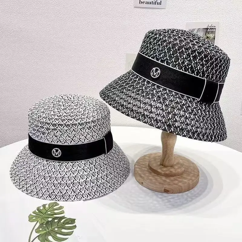 

Japanese high-end black and white hollow breathable sunscreen visor children summer vacation British temperament bucket hat