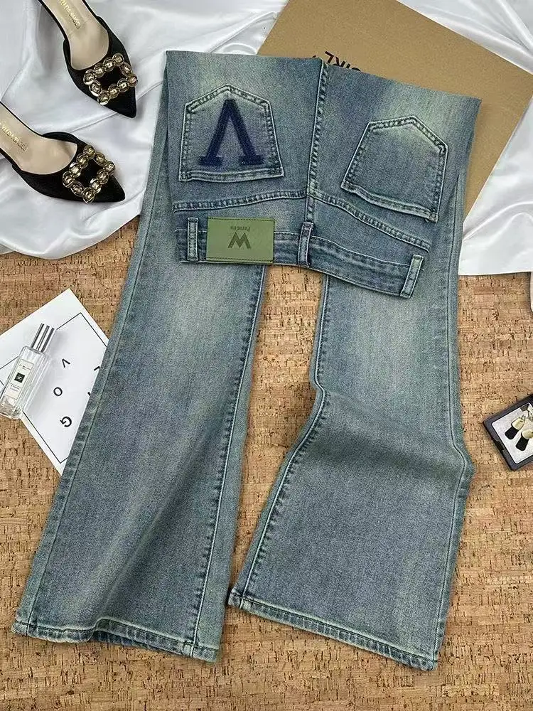 جينز جميل عالي الجودة للنساء بمزاج ربيعي عالي الخصر للتخسيس متعدد الاستخدامات سروال غير رسمي للمكتب للسيدات من قماش الدنيم