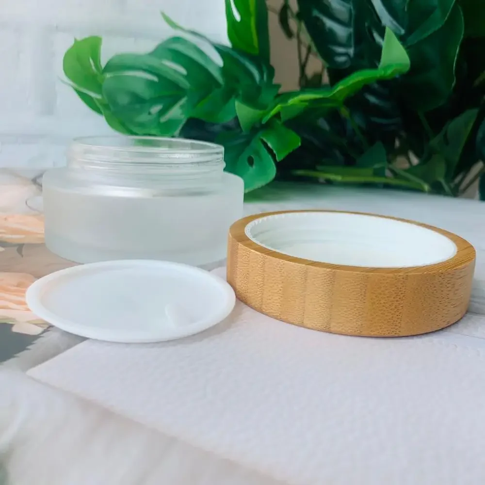 

Hot sale portable mini cute makeup container refillable bottle Environmental protection glass jar CBD Hemp Cream wood containers