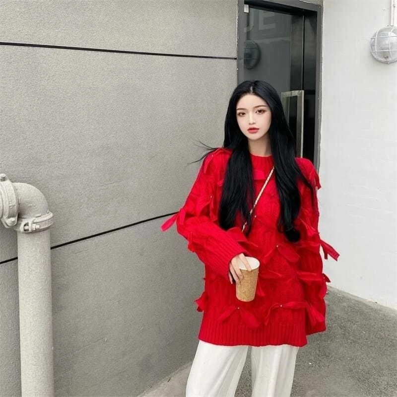 

Autumn and winter new three-dimensional bow ribbon Korean version loose slit medium long knitted sweater for women