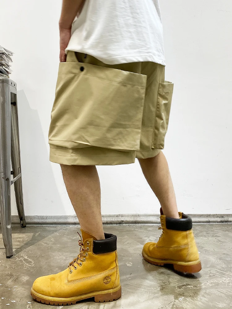 Letnie koreańskie modne duża kieszeń szorty Cargo męskie ubrania japońska moda uliczna wysokiej jakości nylonowe spodnie luźne w stylu Casual