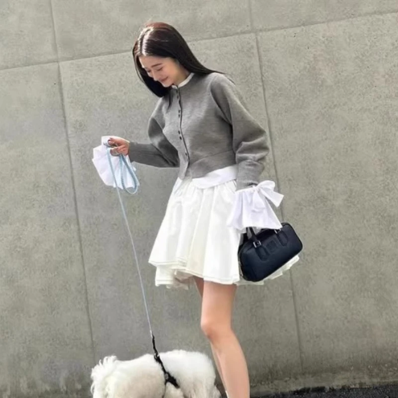 النمط الياباني الحلو الأبيض تنورة قصيرة ربيع الخريف 2025 المرأة مرونة الخصر غير النظامية منتفخ تنورة الفتيات اليومية تنورة غير رسمية #4