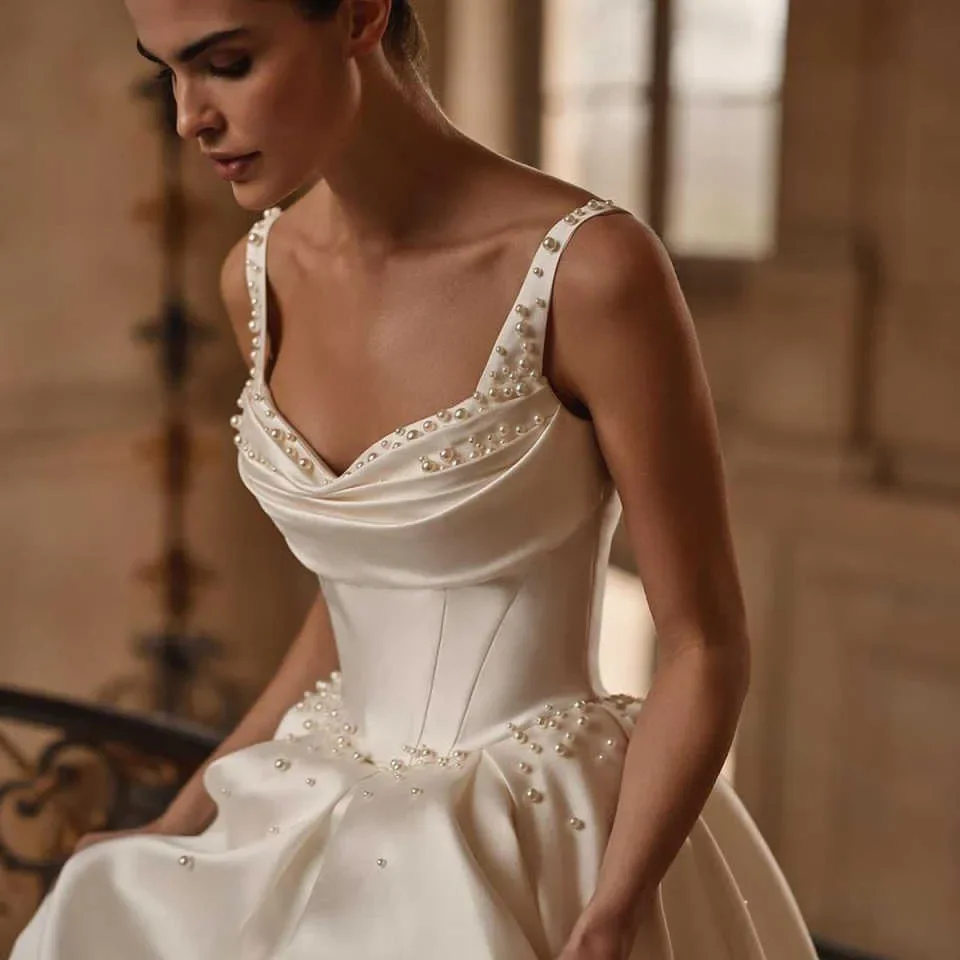 Customized Elegant Pearls A Line Satin Wedding Dresses Spaghetti Straps Bride Gowns Sleeveless Backless Bridal Vestidos De Novia