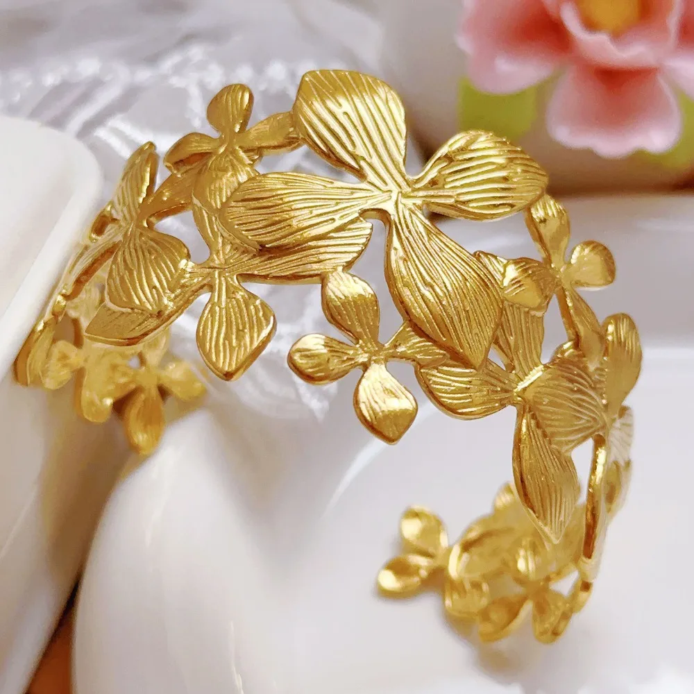Artistic Gold Color Stainless Steel Open Adjustable Hollowed-out Overlapping Flower Wide-faced Bangle for Girl Designer Jewelry
