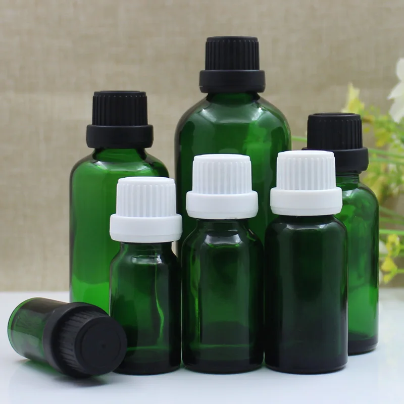 24 pezzi 5 ml 10 ml 15 ml 20 ml 30 ml 50 ml 100 ml Bottiglia di olio essenziale di vetro verde Bottiglia vuota per imballaggio cosmetico Cura personale con coperchio