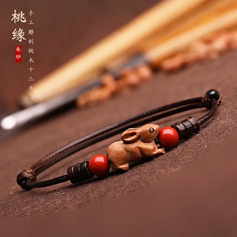 

Natural Mahogany Three-dimensional Cute 12 Zodiac Hand Rope Benmingnian Red Rope Hand-woven Wooden Bracelet for Men and Women