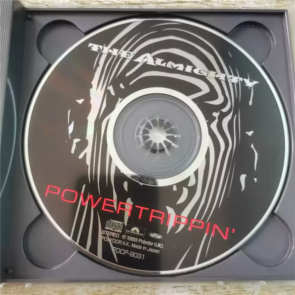 قرص مضغوط The Almighty Powertrippin ألبوم هارد روك/معدني ثقيل تم إصداره فرقة الروك البريطانية The Almighty في عام 1993 #5