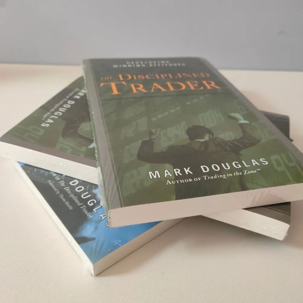 تجارة مارك دوغلاس في المنطقة وغلاف ورقي لكتب التاجر المنضبط باللغة الإنجليزية