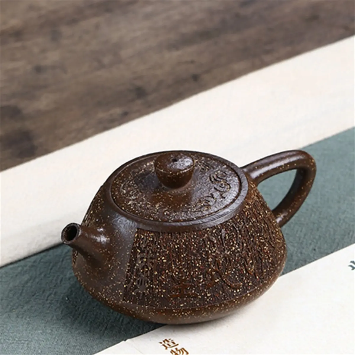 

Super Hot Sale Brand 100ml Clay Teapots Raw Ore Stone Scoop Tea Pot