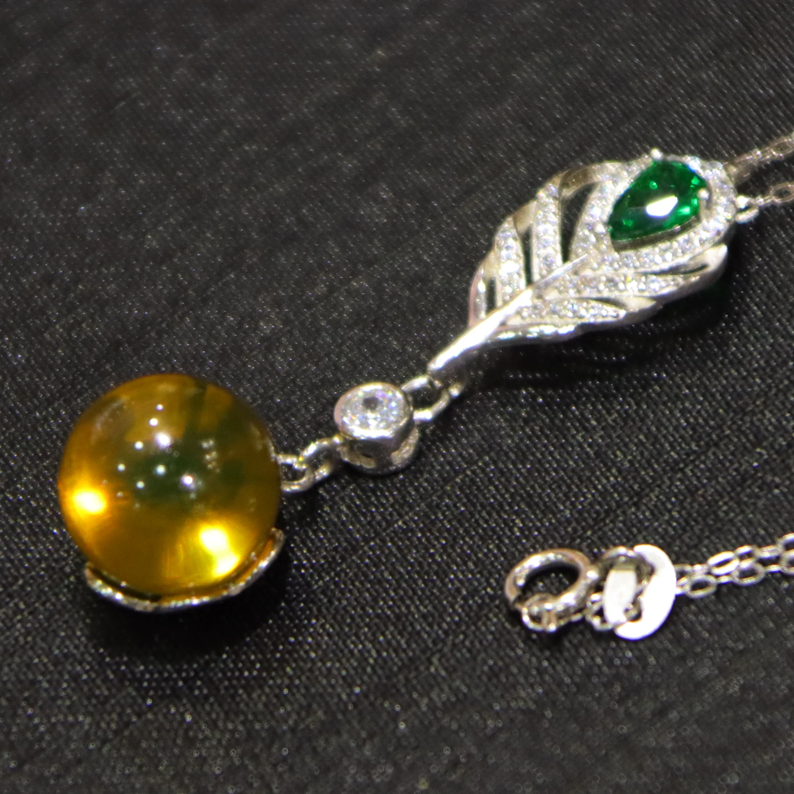 Pure Silver Feather Clasp with Natural Mexican Blue Amber Pendant 11mm Amber Bead Includes a Sterling Silver Necklace