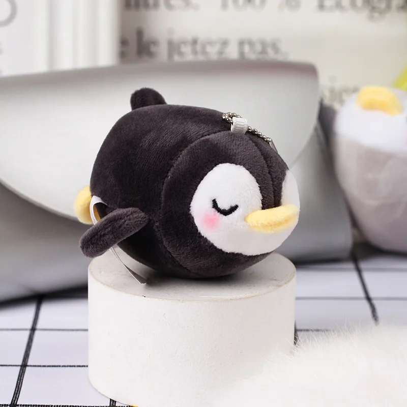 オーシャンパークのかわいい眠っているペンギンのぬいぐるみ、北極ペンギンの人形、バックパックペンダント、キーホルダー、学生のバックパックの装飾ペンダント