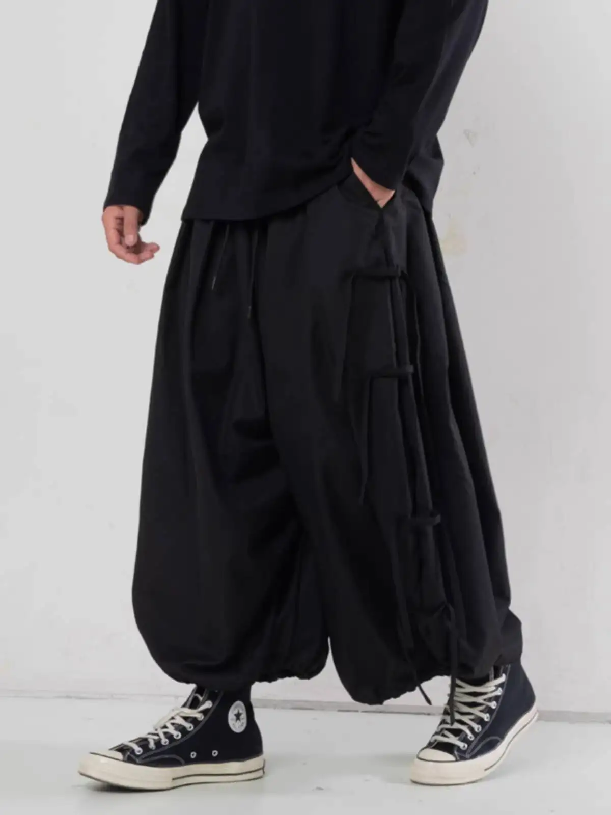 

Мужские повседневные брюки-палаццо с оригинальным дизайном ленты, осенне-зимние, в стиле «Темный воин», больших размеров, длиной до щиколотки.