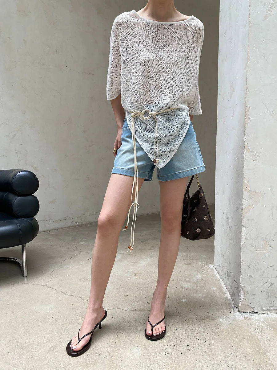 Sommerliche Damen-Casual-Shorts aus Denim in einfarbigem Design mit weitem Bein und A-Linie, figurschmeichelnd und als Hotpants geeignet. – Detail 16