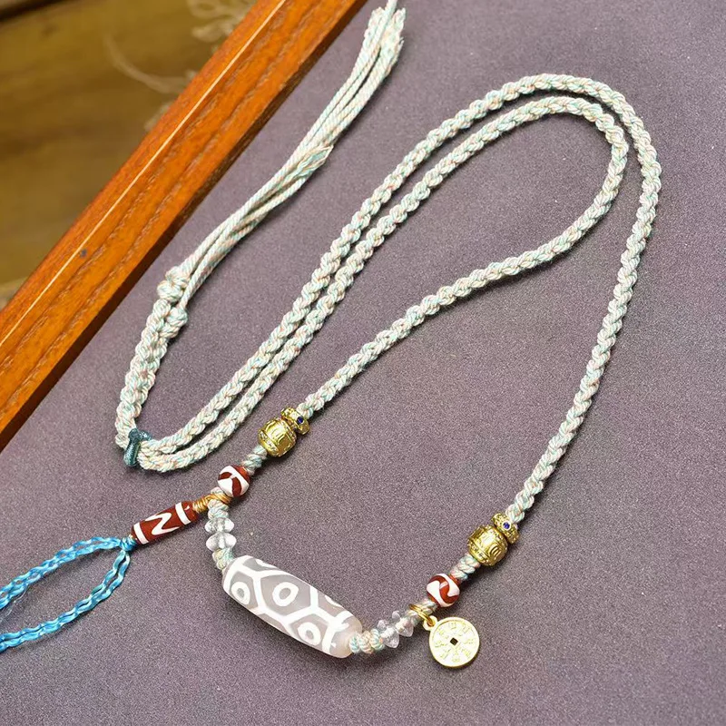 

Handmade woven rope necklace, adjustable, Tibetan-style, natural agate nine-eye dzi bead pendant, sweater chain accessory