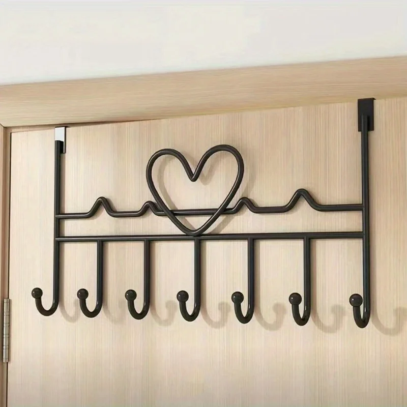 Love shaped hook without punching clothing storage bracket