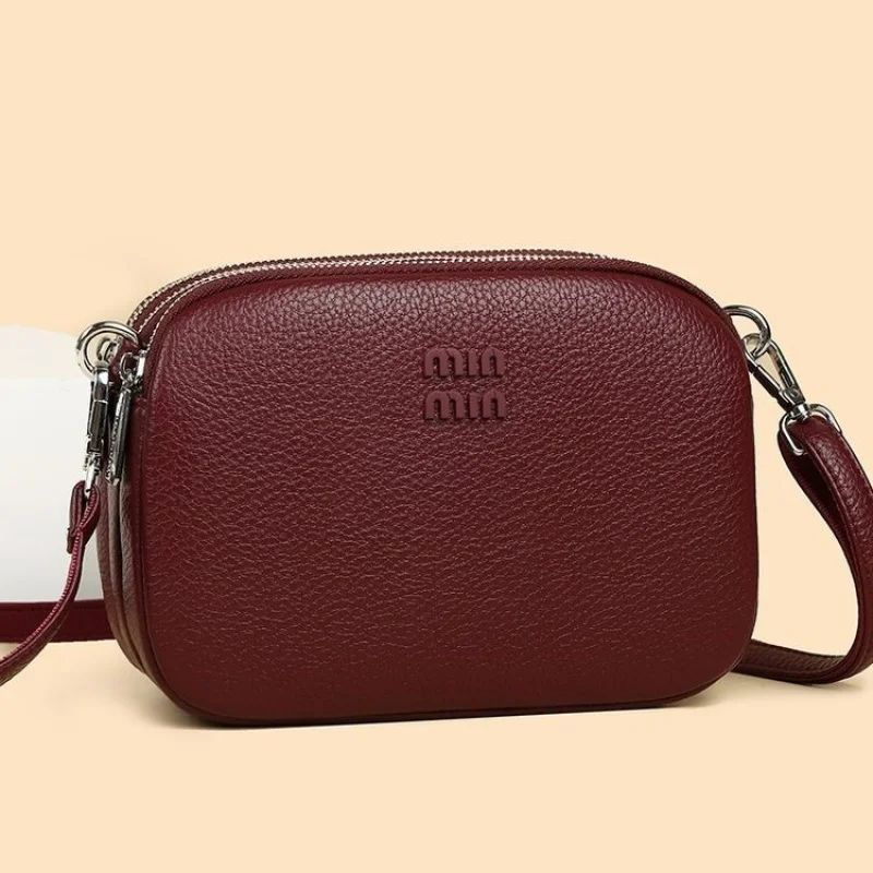 2025 nova bolsa de mão de couro feminina high-end marca de luxo famoso designer clássico simples paris chique estética ​