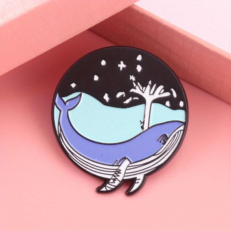 

Celestial Whale Pin - Gradient Blue Marine Guardian with Starry Night Canopy & Silhouetted Tree Motif, Artistic Jewelry for Cosm