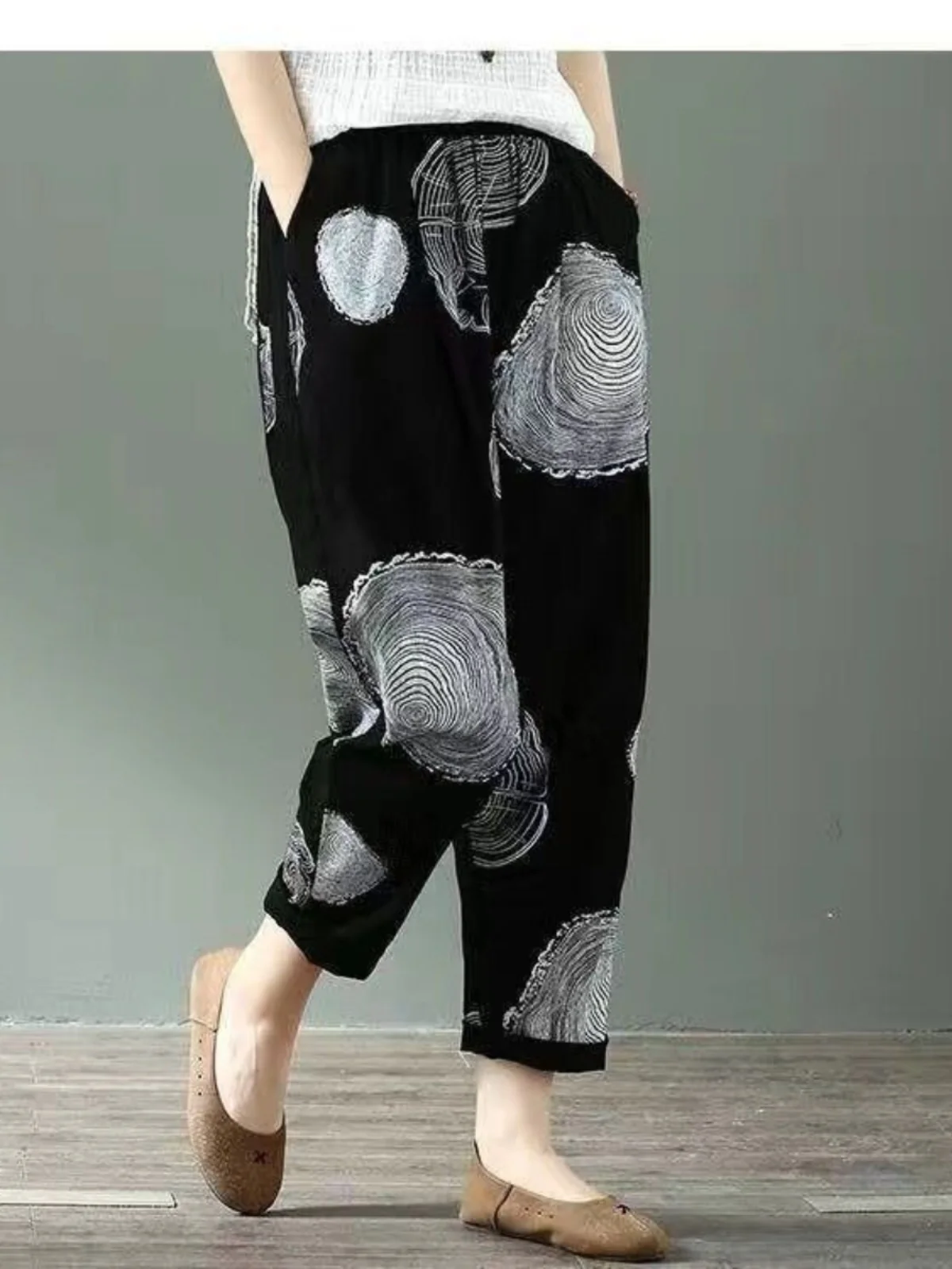 กางเกงแฟชั่นฮาร์ลานสำหรับผู้หญิง ฤดูร้อน ผ้าฝ้ายลินินบางเบา สไตล์ลำลอง ทรงหลวม ช่วยให้ดูผอม กางเกงขา 7 ส่วน เอวสูง ยางยืด