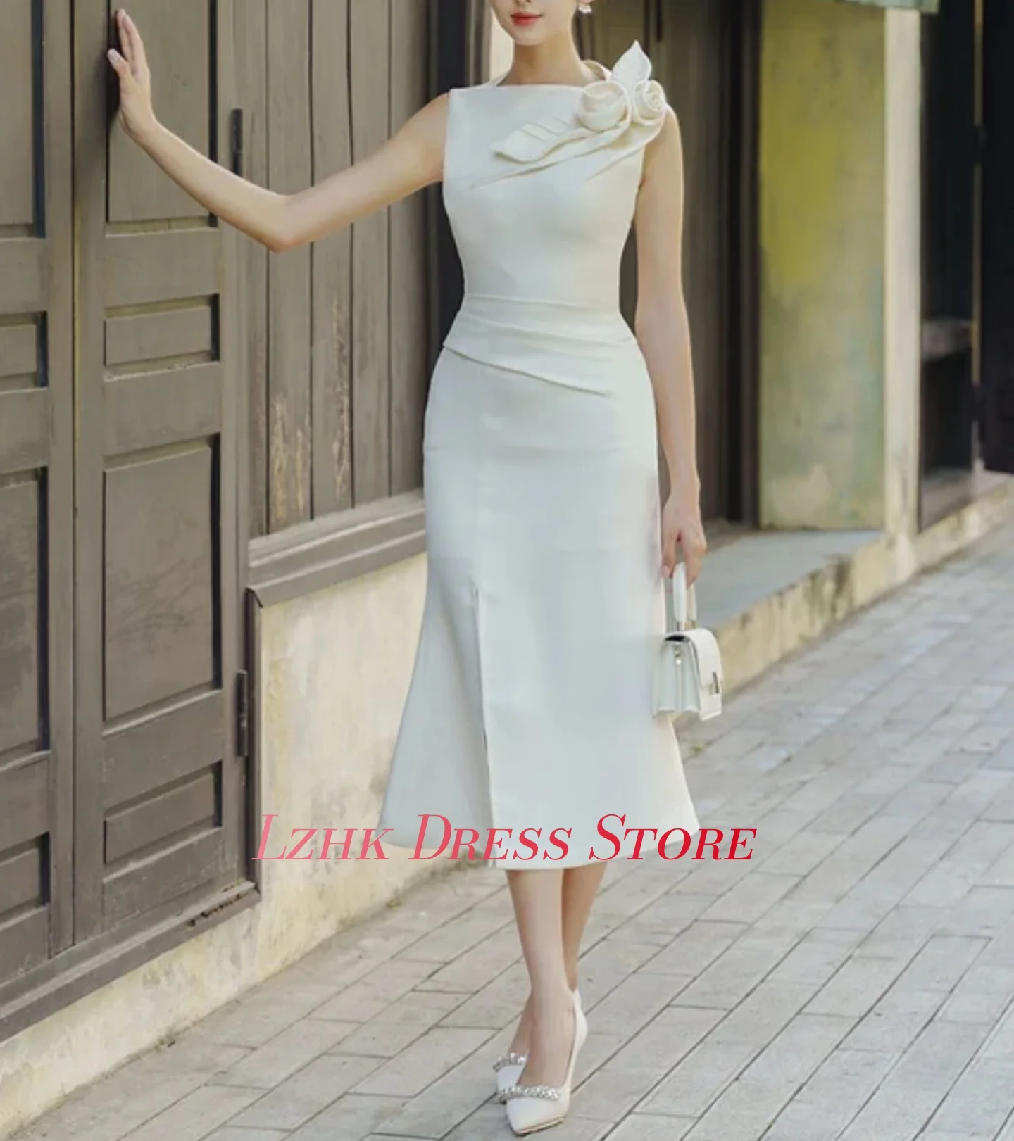 ชุดราตรีทรงเมอร์เมดคุณภาพสูงสั่งตัดพิเศษ แต่งดอกไม้ 3 มิติ แขนกุด คอทรงโอ ยาวระดับชา ฟัสต์อาน سهرات