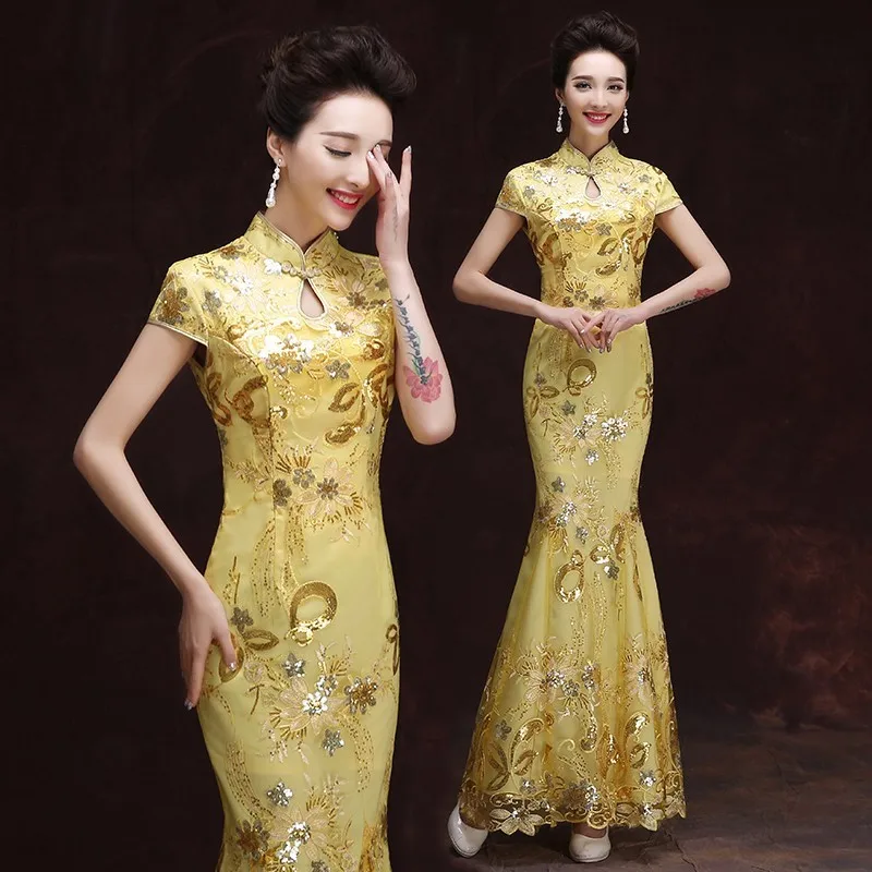 The hostess's catwalk in a cheongsam performance features long form-fitting Chinese-style dress and banquet skirt
