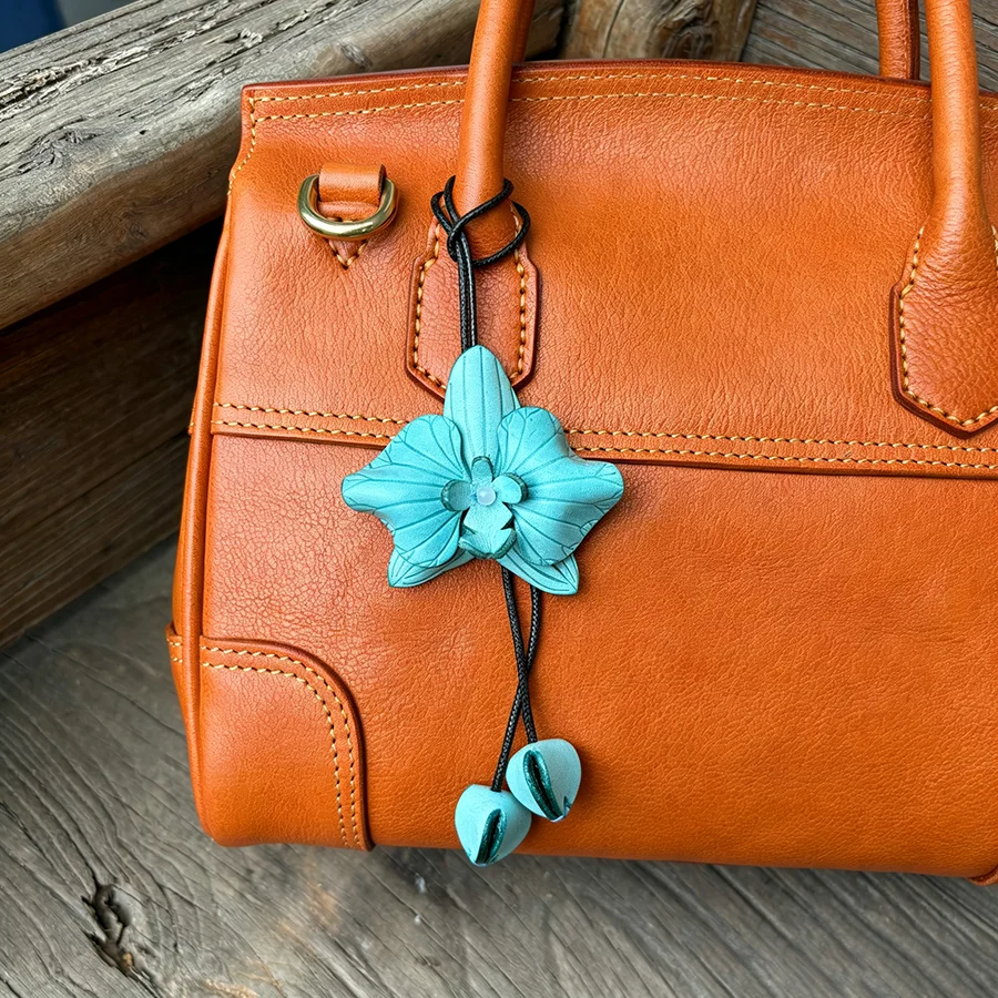 Phalaenopsis Cowhide Blossom Flower Bag Pendant Hand-woven Niche Wind Chimes Flower Keychain Decoration Bag Charm 2027 New